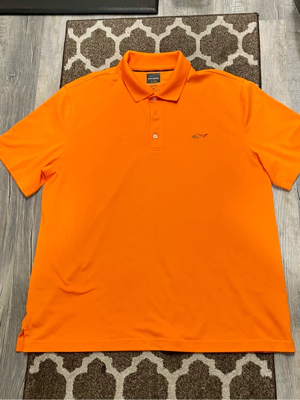 Greg Norman men's bright orange golf polo shirt shark